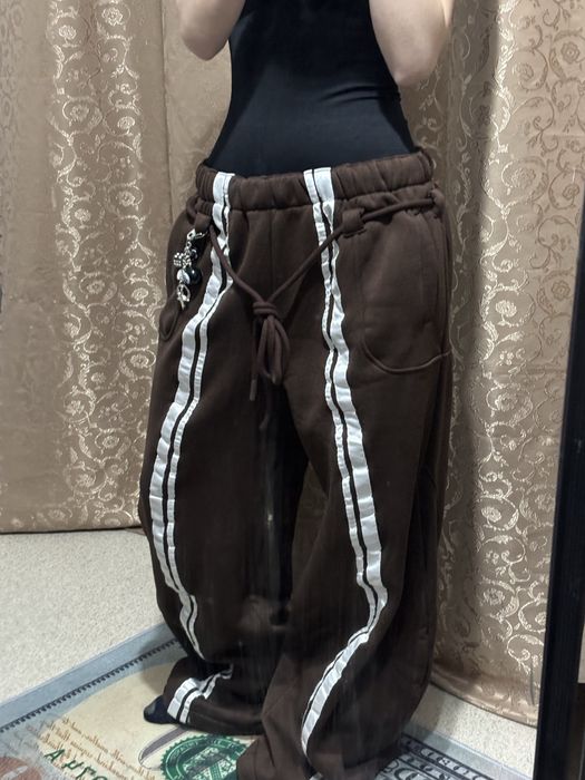 Коричневые трико