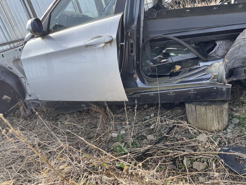 prag stanga tabla bmw e90 2006