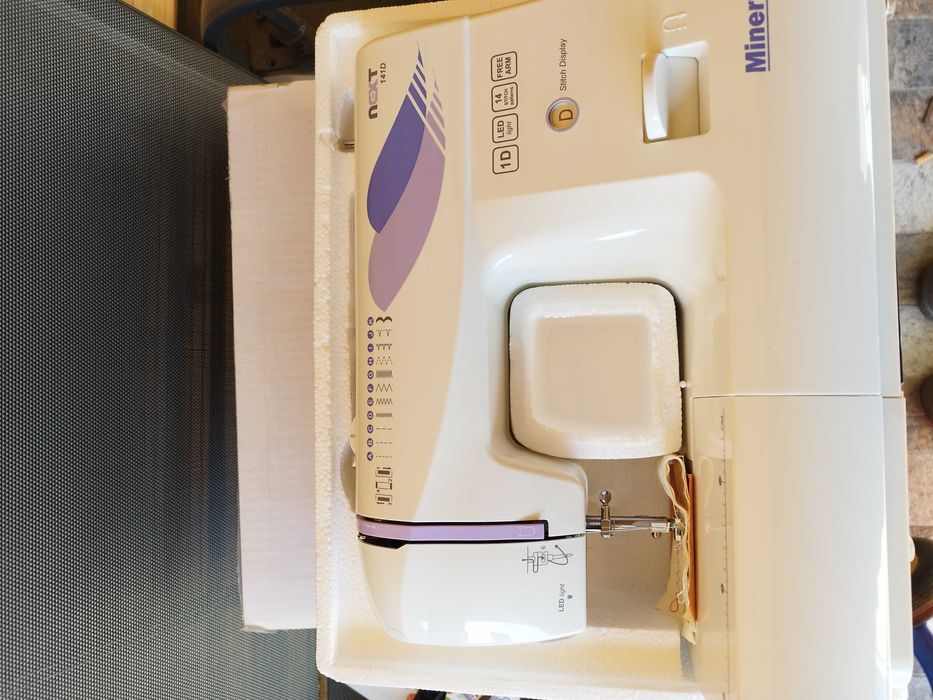 Masina de cusut Minerva Next141d