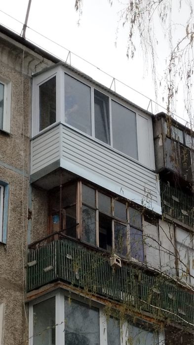 Балконы с обшивкой