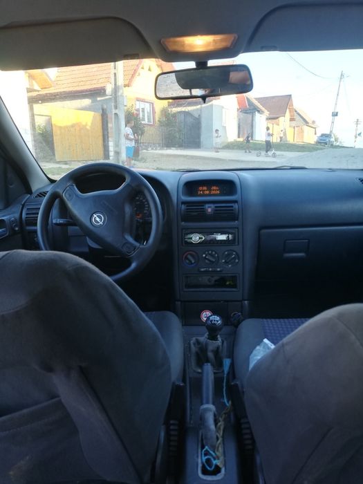 Mașina de vânzare Opel astra G