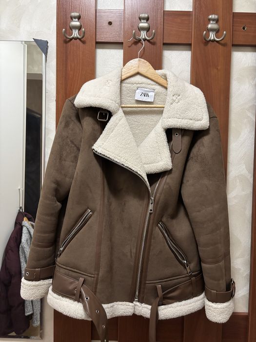 Теплая дубленка.
