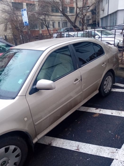 Vând scoda octavia