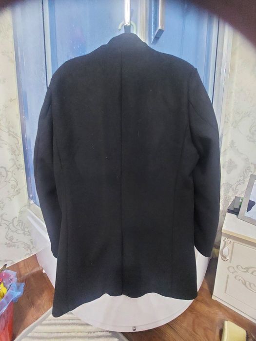 Мужской палто сотилади