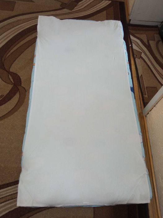 Детско легло с люлеещ механизъм