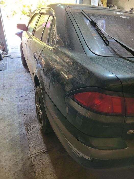 Мазда 626 птичка