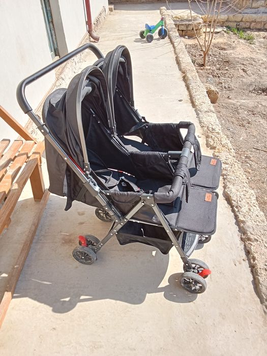 Егизек коляска сатылады.