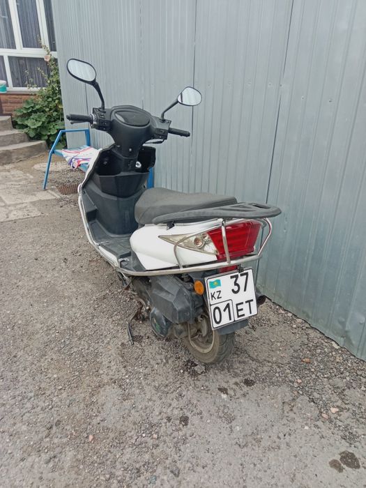 Продам скутер на ходу на учёте с номером