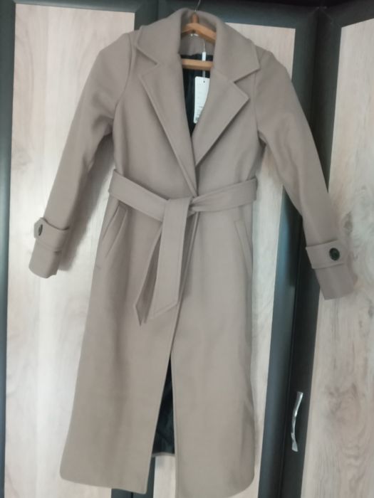 Продам новое пальто