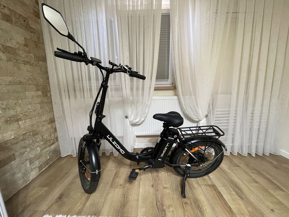 Bicicletă electrică UZOMO – stare foarte bună – 2700 lei (negociabil)