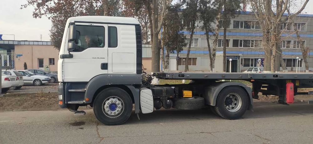 Uz MAN 19.400 ва прицеп UzAuto Trailer бортли контейнеровоз 2в1