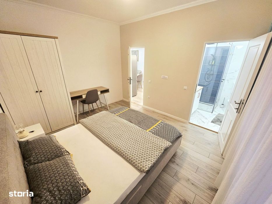 Dau în chirie apartament 4 camere-zona Ultracentrala