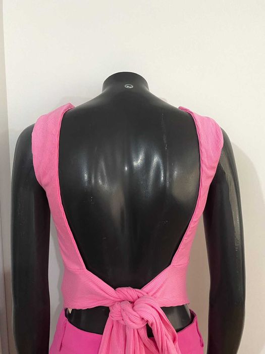 Розов потник с гол гръб