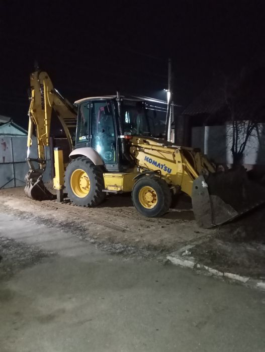 Услуги экскаватора- погрузчика