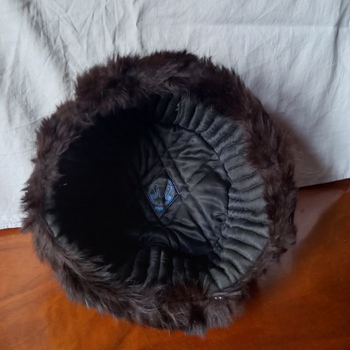 шапки и куртка Caprice.