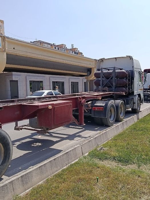 HOWO A6 + Контейнеровоз прицеп Сотилади