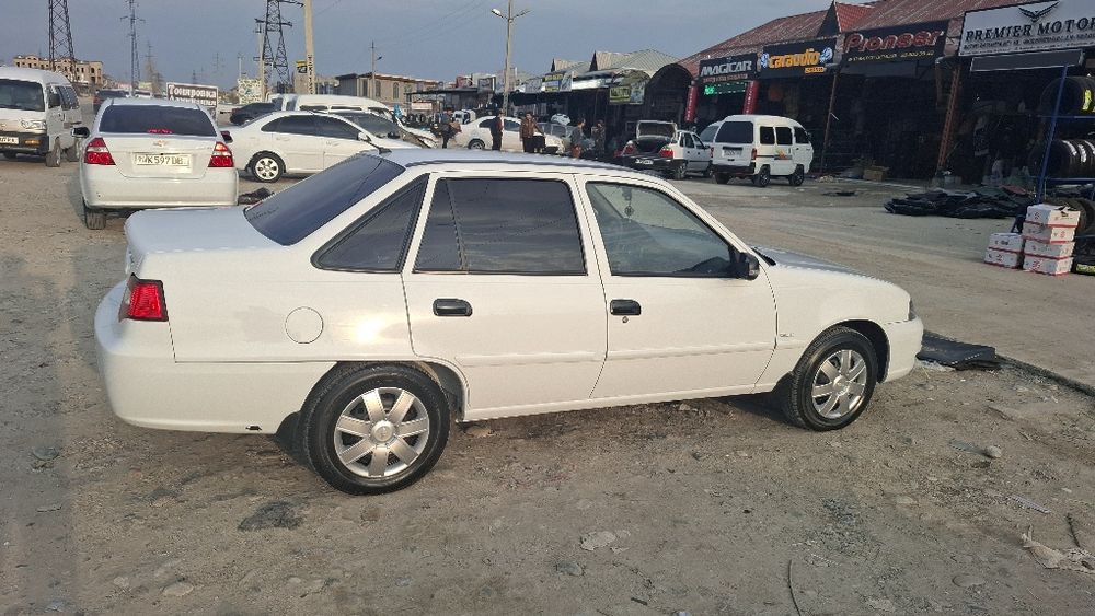 Нексия 2 топ тоза.50 минг юрди. супер канденсанер.