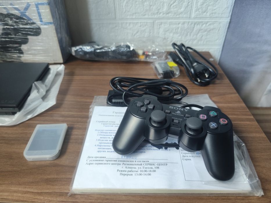 Новая PS2 SLIM..
