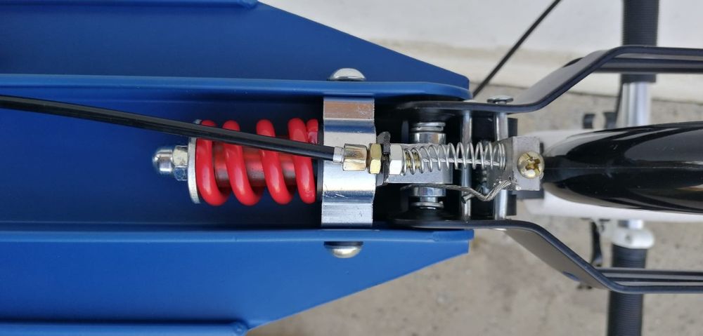 Trotineta/pliabila/DISC/suspensie dublă/frână duală/aluminiu/max:100 kg