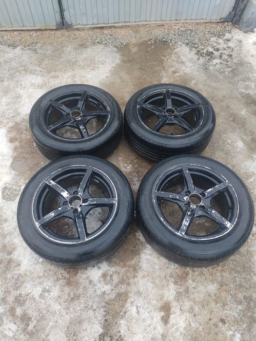 Продам тинатоныве диски с шинами