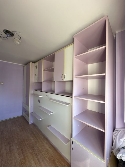 Pat rabatabil cu spatii de depozitare