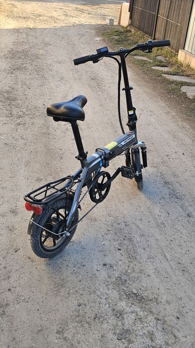 Bicicleta electrica vand/schimb cu telefon