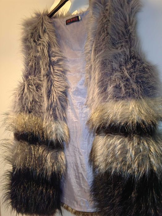 Дамски пухен елек