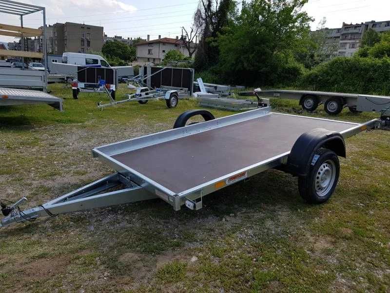 Ремарке,платформаремарке с повдигащ механизъм кат Б,750кг