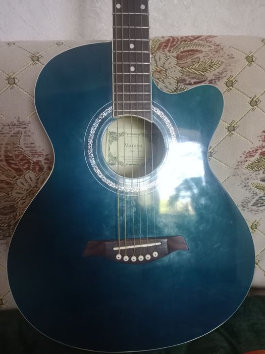 Гитара почти новый