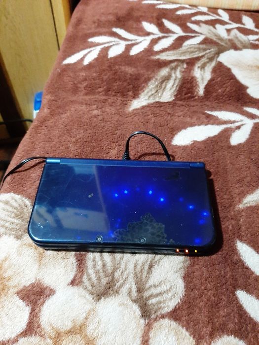 Vând New Nintendo 3ds XL blue în stare bună estetică impecabil