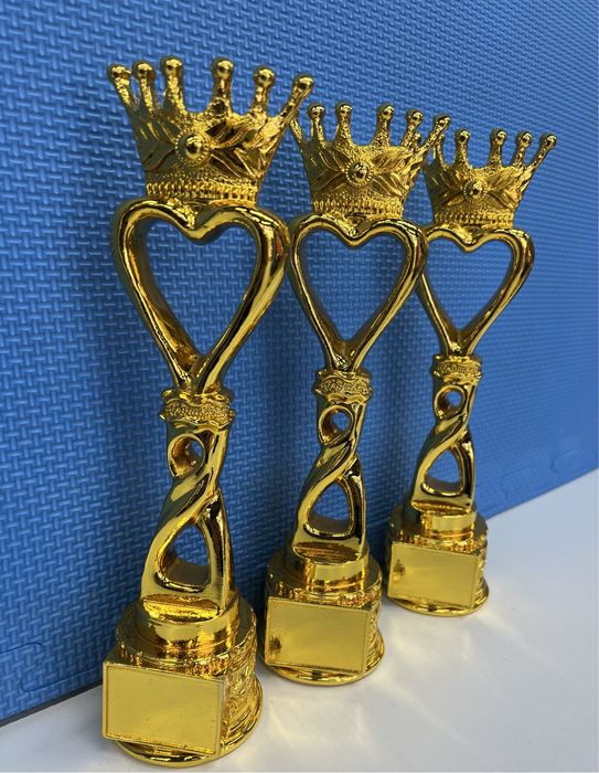 Статуэтки кубки медали награды