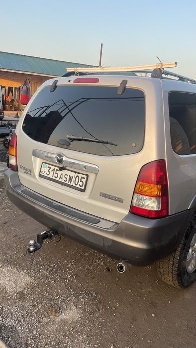 Мазда трибьют 3 литра