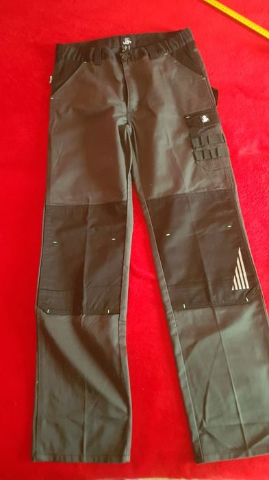 Pantaloni de lucru cu pieptar