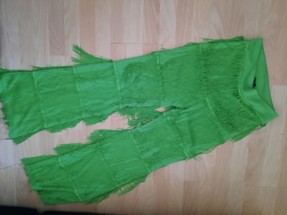 Pantaloni eleganti cu franjuri