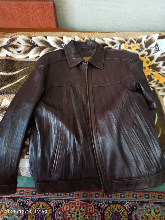 Кожаный пиджак. Одевалась один раз.