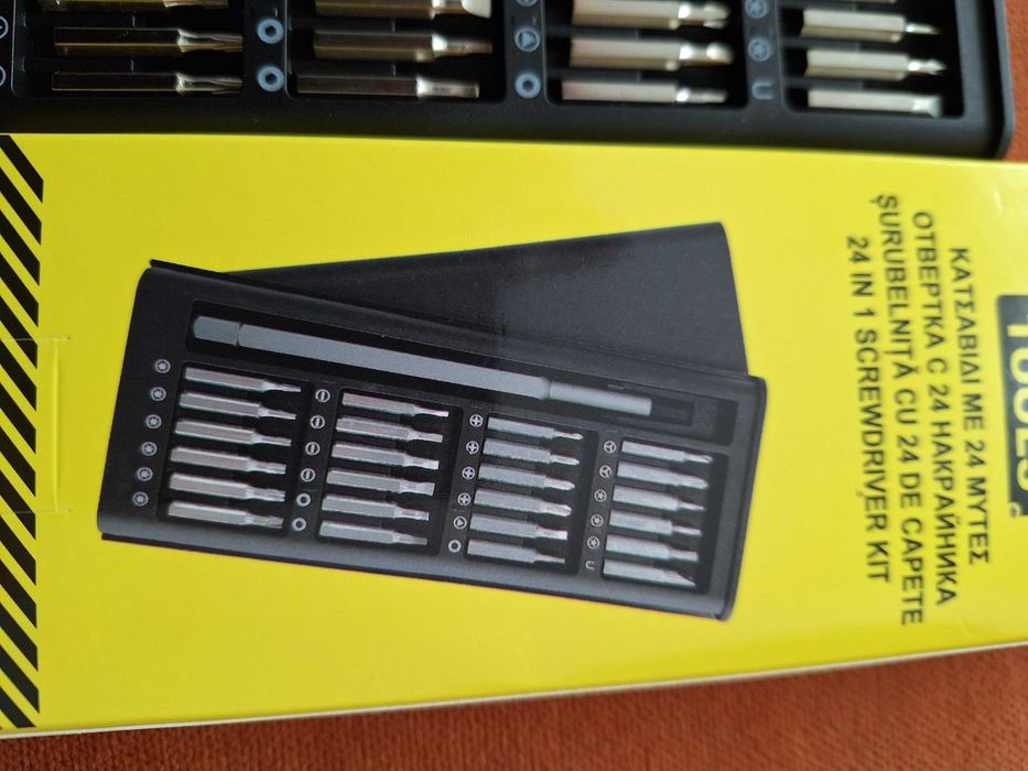 Trusa  surubelnita metalica cu 24 biti + cutie depozitare transport