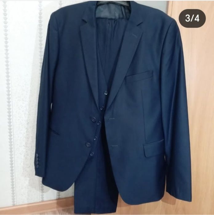 Продам костюм тёмный синий