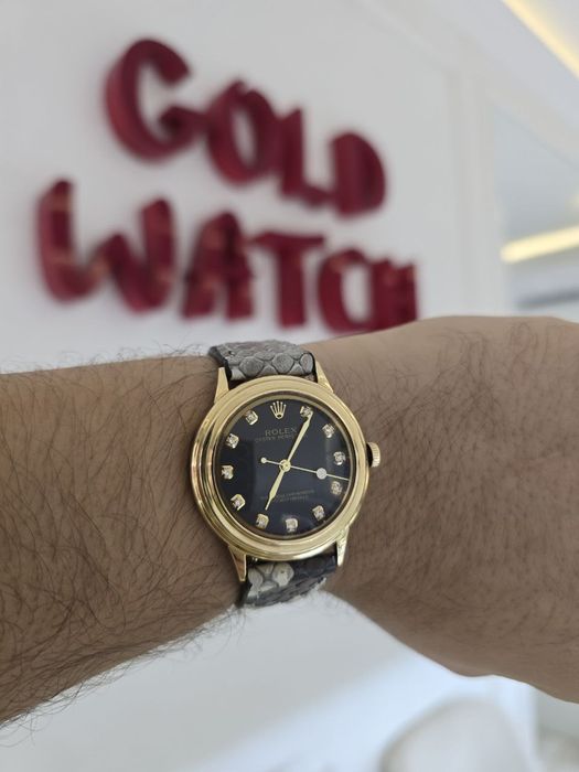 Унисекс модель Ролексов с очень красивыми ремнём из натурального питон