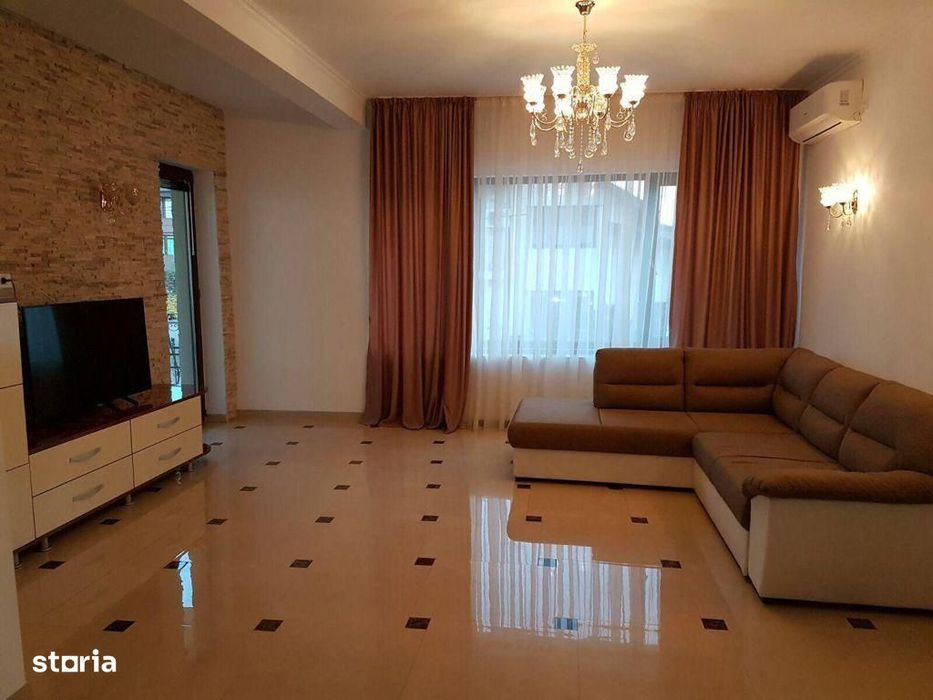 Casa individuala cu 5 camere, demisol cu garaj.