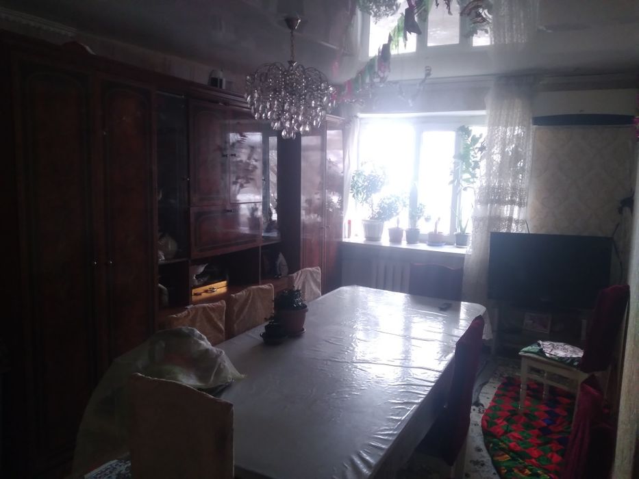 Үш бөлмелі пәтер.