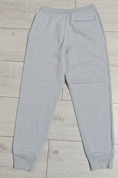 Pantaloni de trening  Underarmour, mărimea 10-11 ani