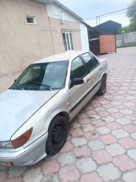 Митсубиси Лансер 6