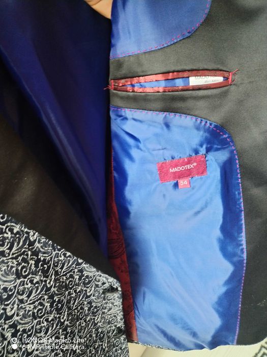 Vind sacouri bărbați