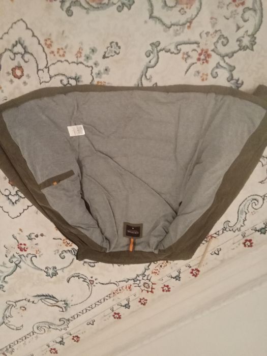 Продам ветровку теплый