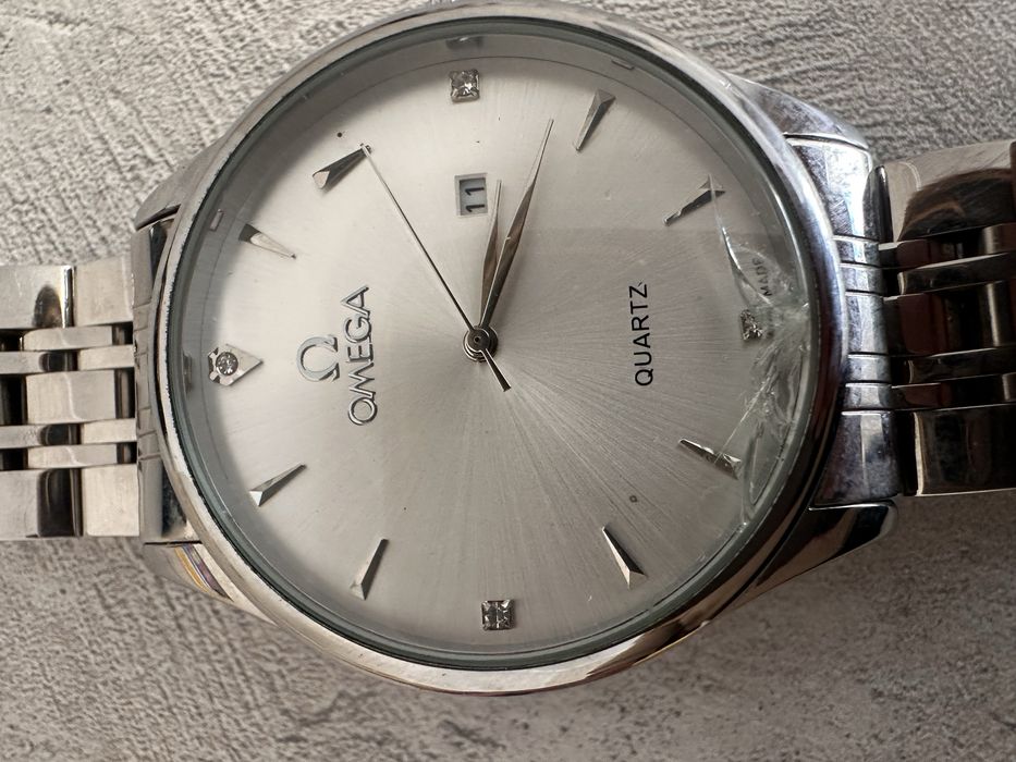 Часы Omega серые кварцовые