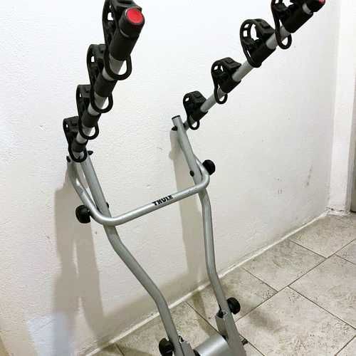 Vând suport biciclete Thule HangOn pentru 4 biciclete + lacăt Thule inclus