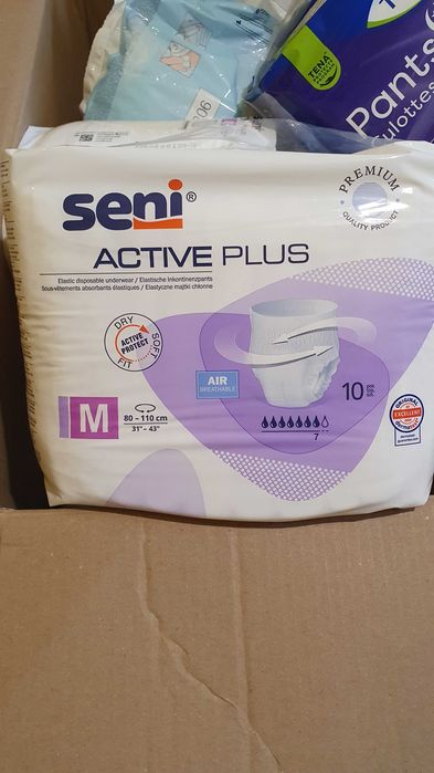 Scutece pentru adulți şi lenjerie de pat impermeabilă