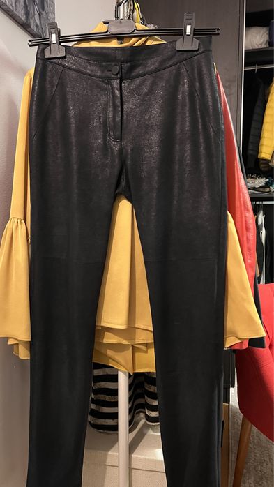 Pantaloni luciosi