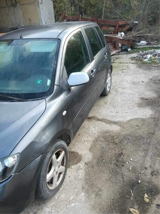 Mazda 2 - на части