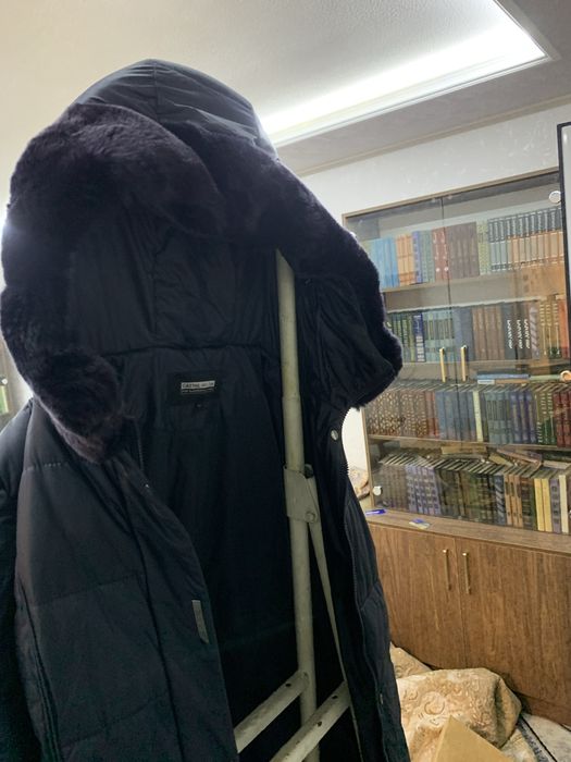 Пуховик женский б/у в хорошем состоянии